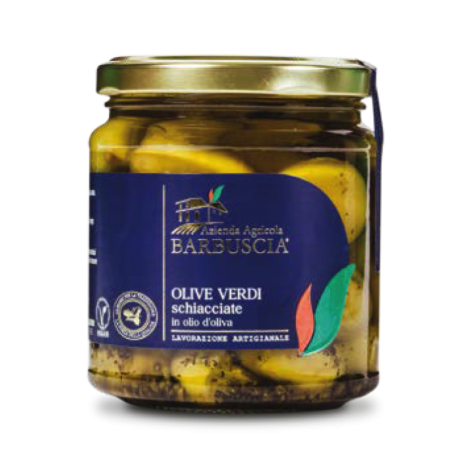 Crushed green olives in...